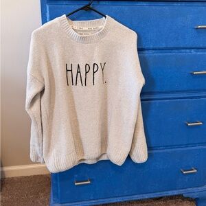 Rae Dunn light gray crewneck sweater with "HAPPY." embroidery